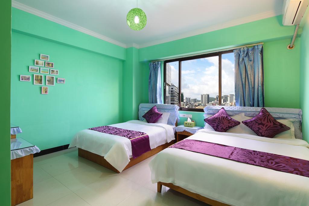 Апартаменты Hantang Holiday House Санья Экстерьер фото