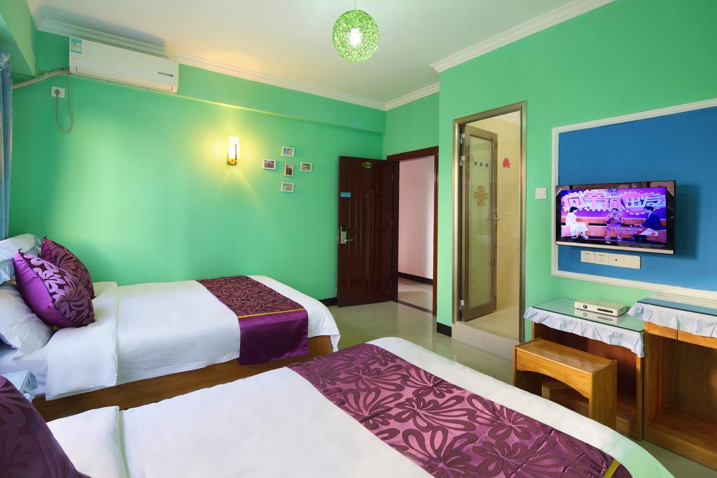 Апартаменты Hantang Holiday House Санья Экстерьер фото