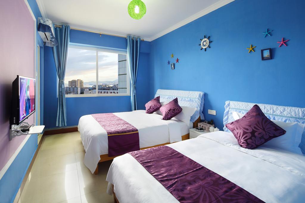 Апартаменты Hantang Holiday House Санья Экстерьер фото